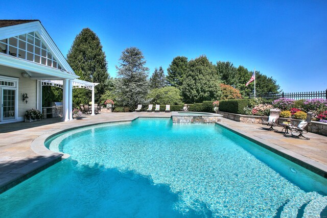 39 Keelers Ridge Rd, Wilton, CT 06897 - view of swimming pool featuring fence, a patio, and a pool with connected hot tub
