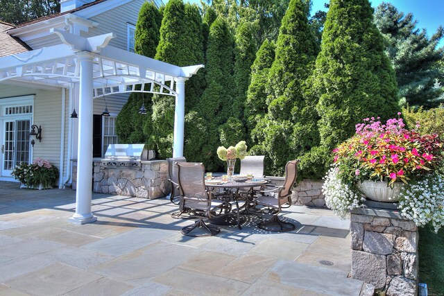 39 Keelers Ridge Rd, Wilton, CT 06897 - view of patio featuring an outdoor kitchen, outdoor dining area, and area for grilling