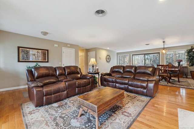 living room featuring light hardwood / wood-style floors