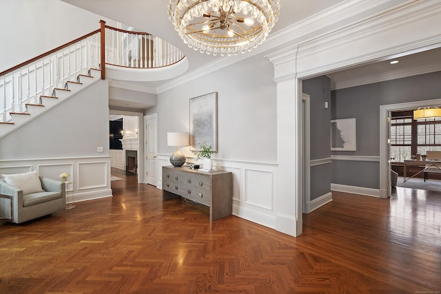 hallway featuring dark parquet flooring, crown molding, and a chandelier