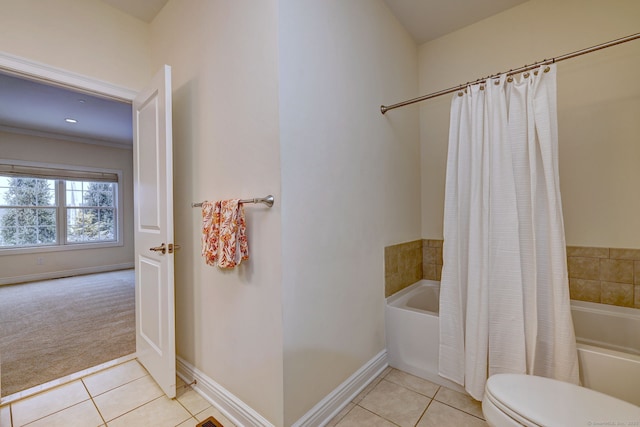 bathroom with tile patterned flooring and toilet