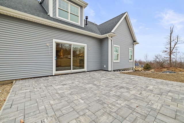 rear view of house featuring a patio