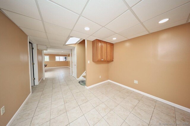 spare room with a drop ceiling