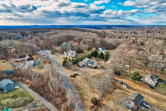 bird's eye view featuring a view of trees