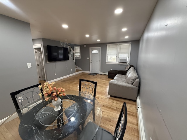 living room featuring hardwood / wood-style floors and a baseboard radiator