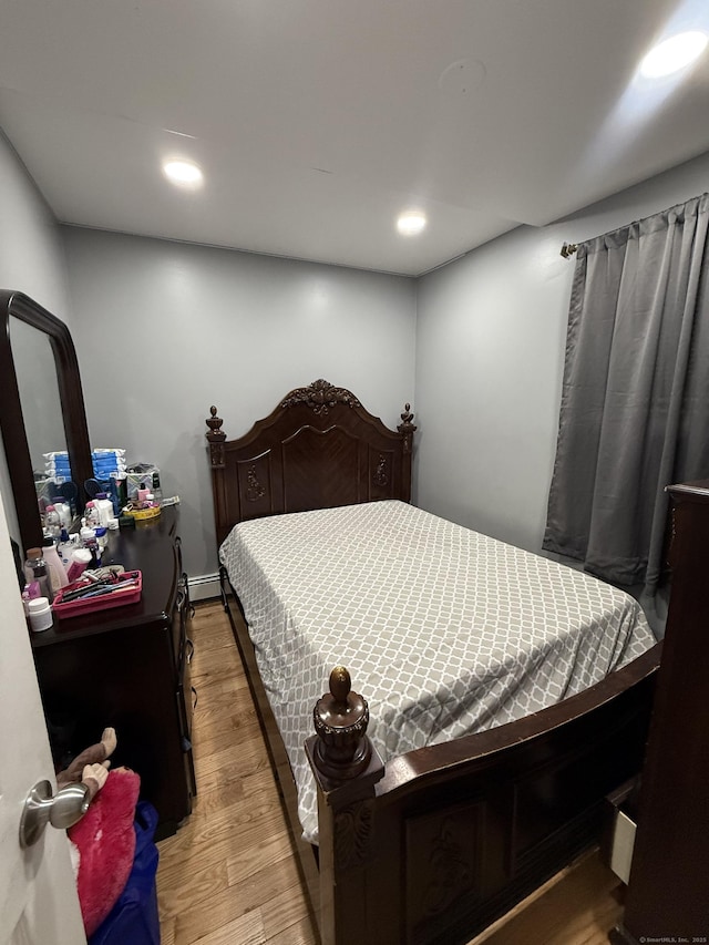 bedroom featuring light wood-type flooring