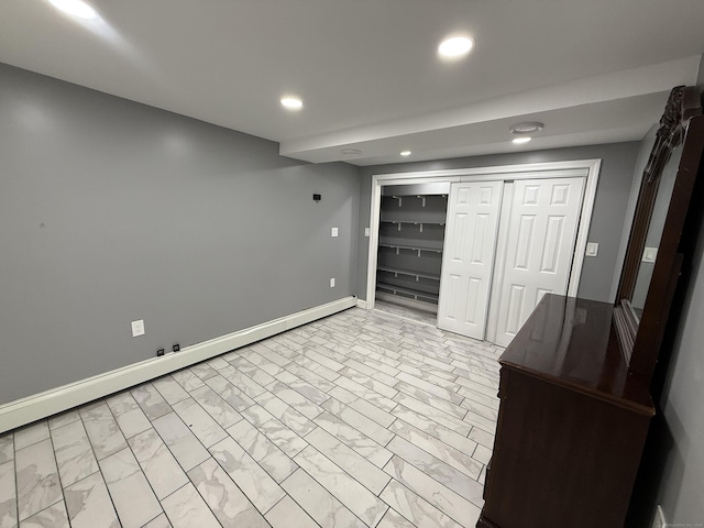 basement with a baseboard radiator