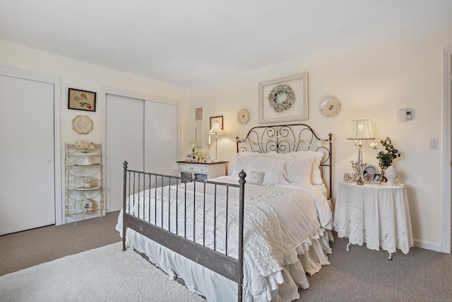 bedroom with carpet floors and a closet