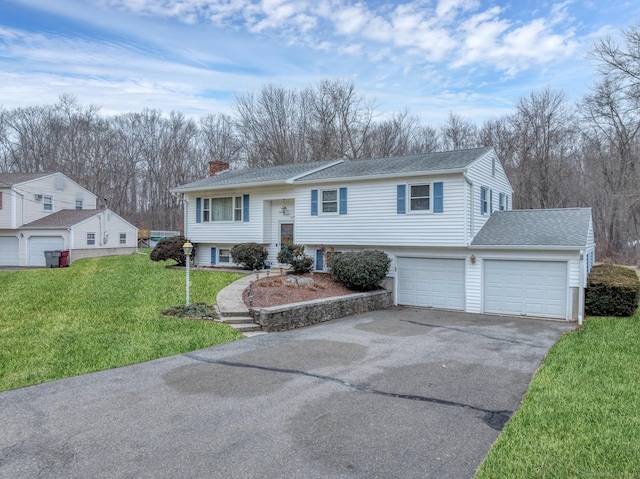 bi-level home with a front yard