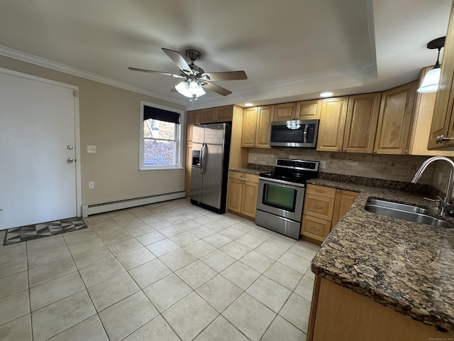 kitchen with pendant lighting, crown molding, sink, a baseboard radiator, and stainless steel appliances