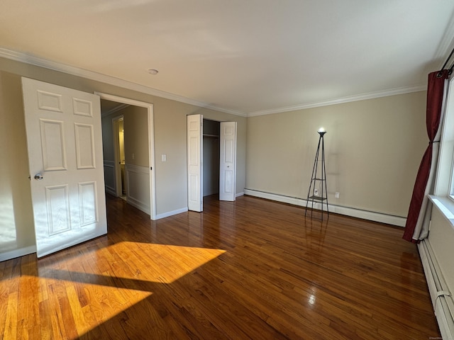 unfurnished bedroom with dark wood-type flooring, a baseboard radiator, and ornamental molding