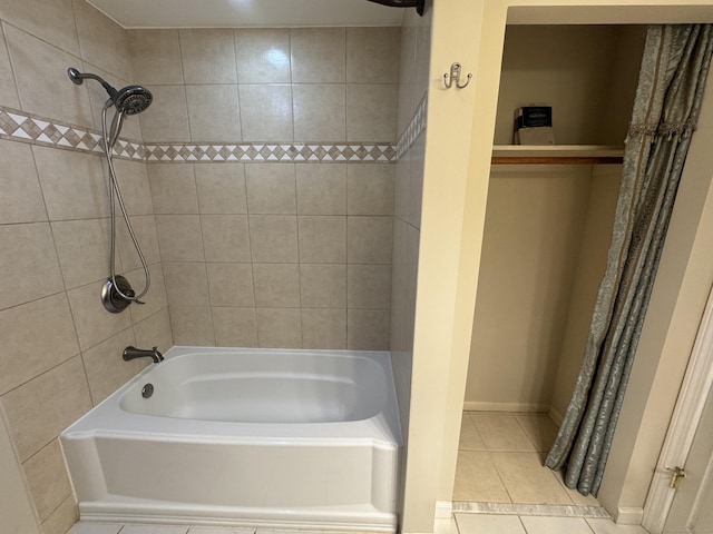 bathroom featuring tile patterned flooring and shower / bath combo