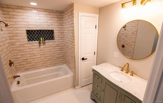 bathroom with vanity, tile patterned floors, and shower / tub combination