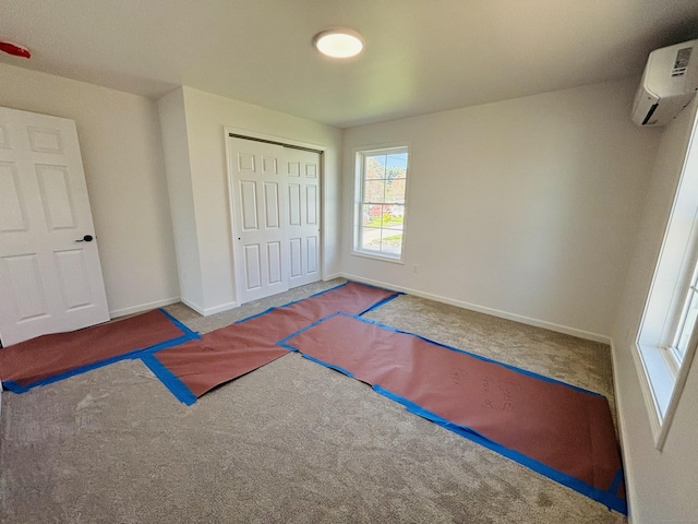 16 Red Bridge Rd, Thompson, CT 06255 - unfurnished bedroom with carpet flooring, baseboards, and a closet