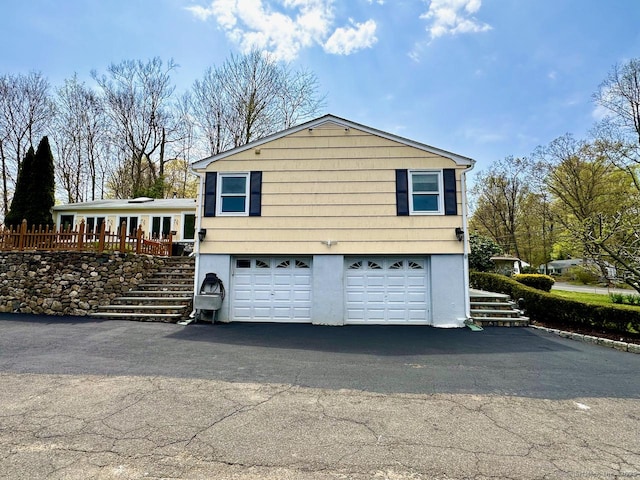 exterior space with a garage