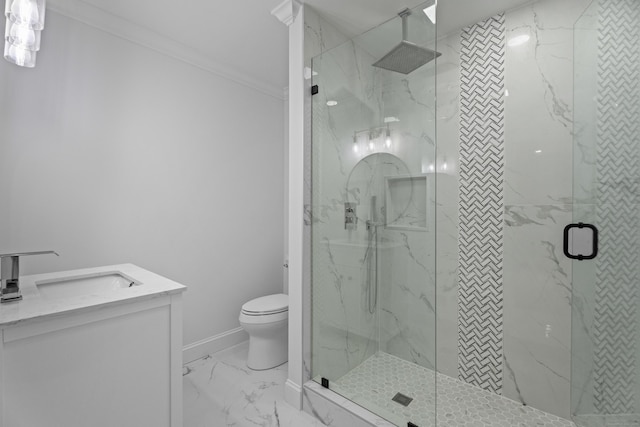 bathroom featuring vanity, toilet, a shower with shower door, and crown molding