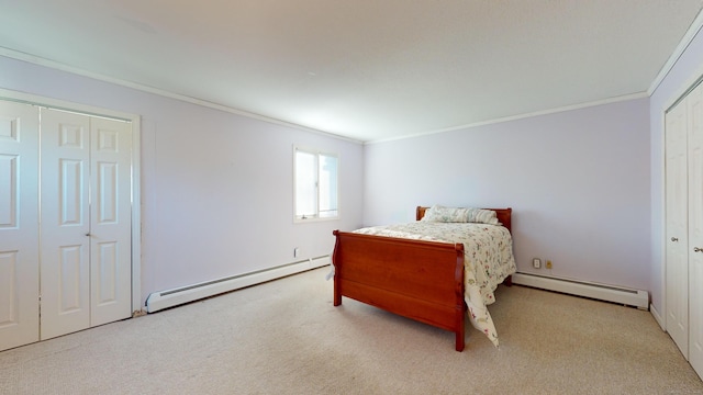 carpeted bedroom featuring baseboard heating and ornamental molding