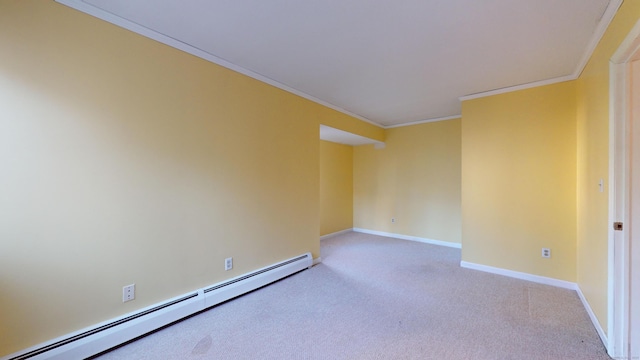 empty room featuring light carpet, ornamental molding, and a baseboard heating unit