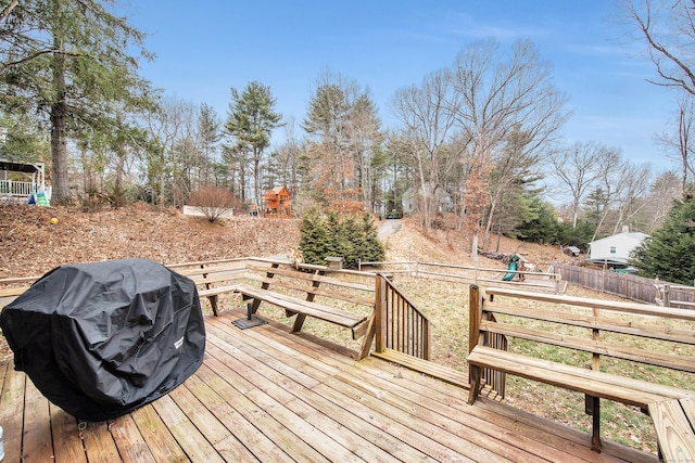 wooden deck featuring grilling area