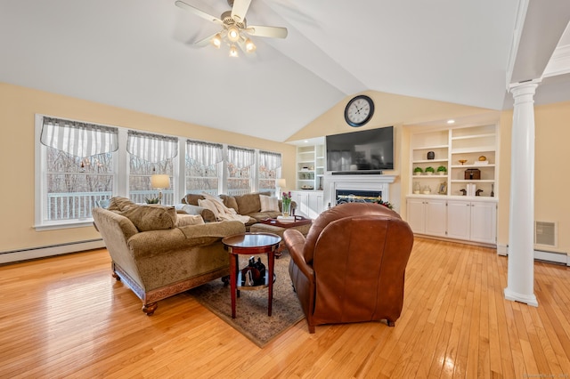 living room with light wood-type flooring, ornate columns, ceiling fan, a baseboard heating unit, and vaulted ceiling with beams