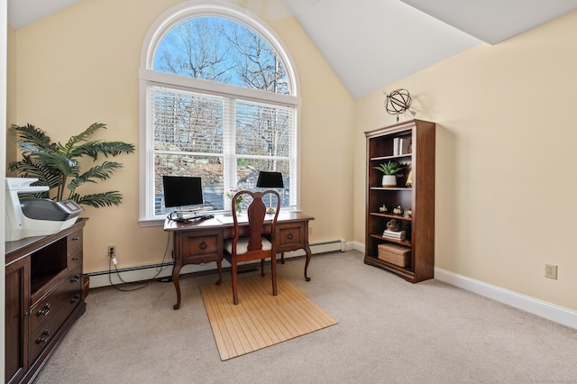 home office featuring light carpet and vaulted ceiling