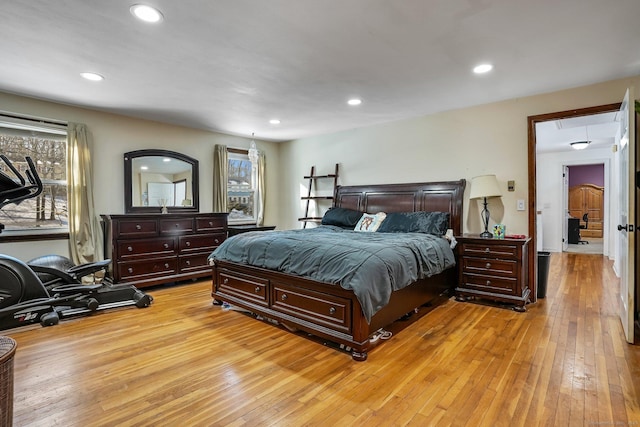 bedroom with light hardwood / wood-style flooring