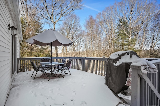 view of snow covered deck