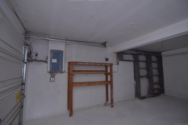 basement featuring electric panel