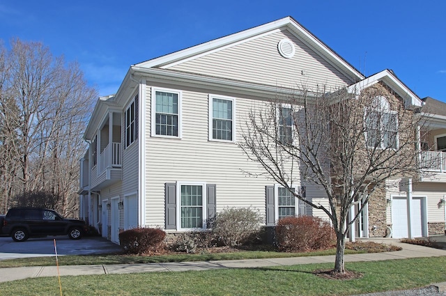 view of property exterior with a garage