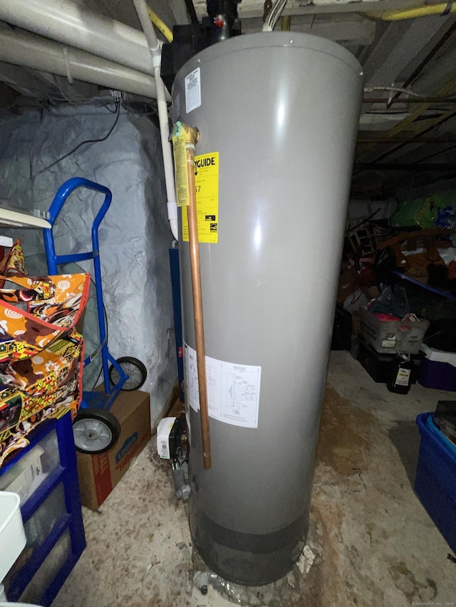 utility room featuring gas water heater