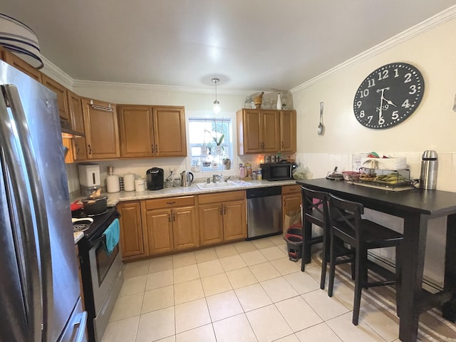 kitchen featuring sink, hanging light fixtures, light tile patterned floors, ornamental molding, and appliances with stainless steel finishes