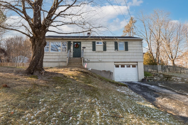 view of front of property featuring a garage