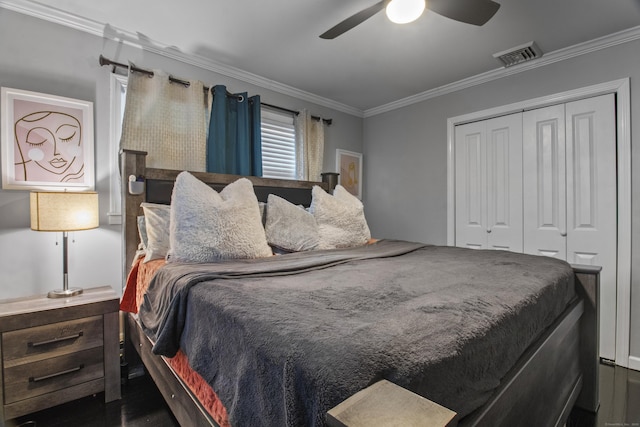 bedroom featuring a closet, ceiling fan, and ornamental molding