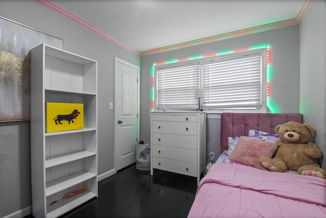 bedroom with dark hardwood / wood-style floors and ornamental molding