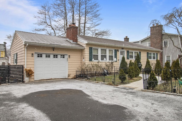 view of front of home with a garage