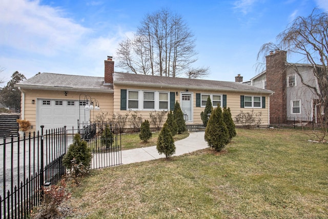 ranch-style home with a front lawn and a garage