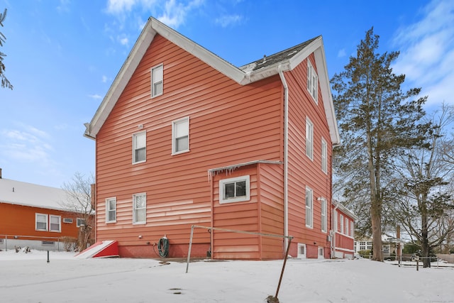 view of snow covered property