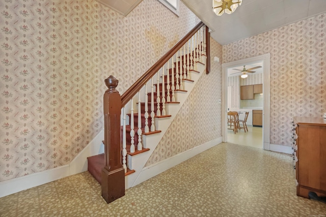 stairway with ceiling fan