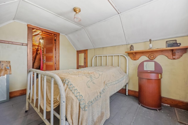 bedroom featuring lofted ceiling