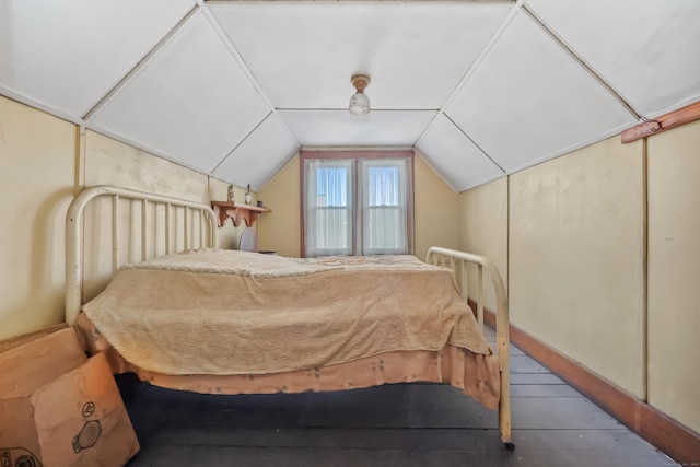 bedroom with lofted ceiling