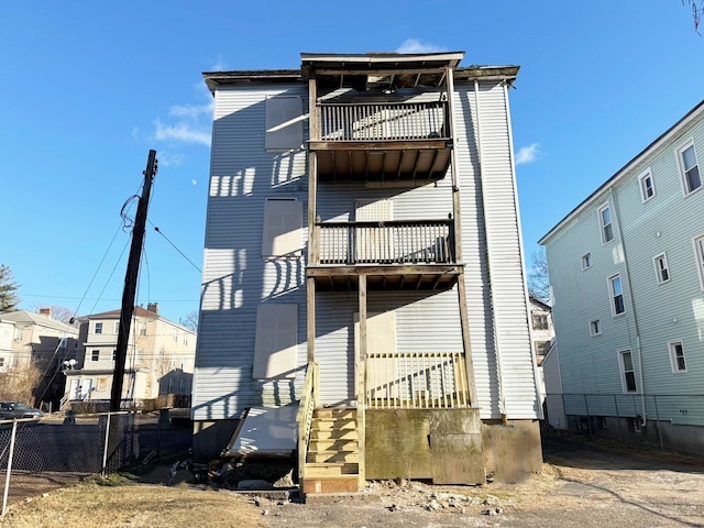 rear view of house with a balcony