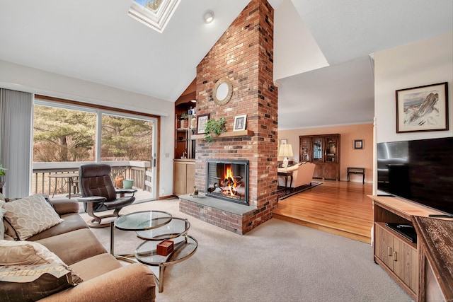 living area with a brick fireplace, high vaulted ceiling, and light carpet