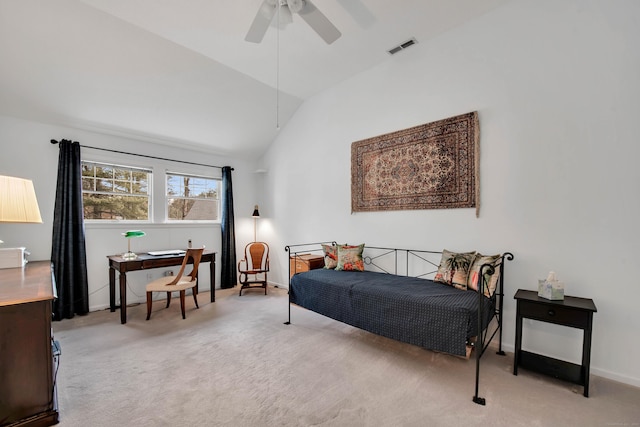 bedroom with vaulted ceiling, baseboards, visible vents, and light carpet