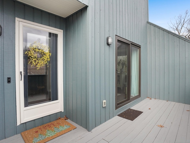 entrance to property with a wooden deck