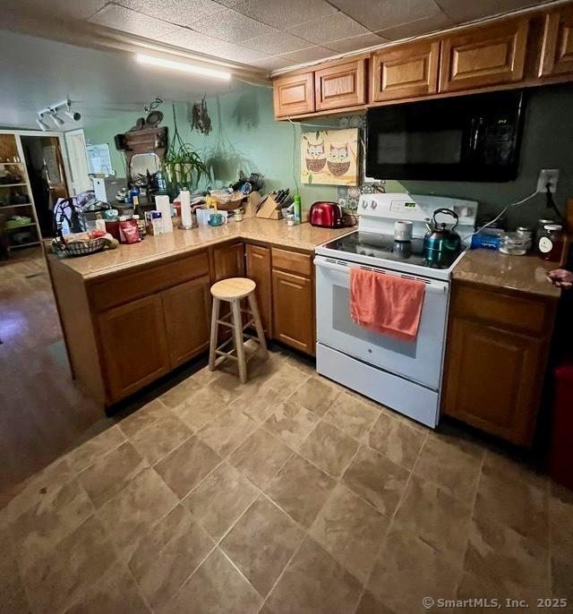 kitchen featuring electric range