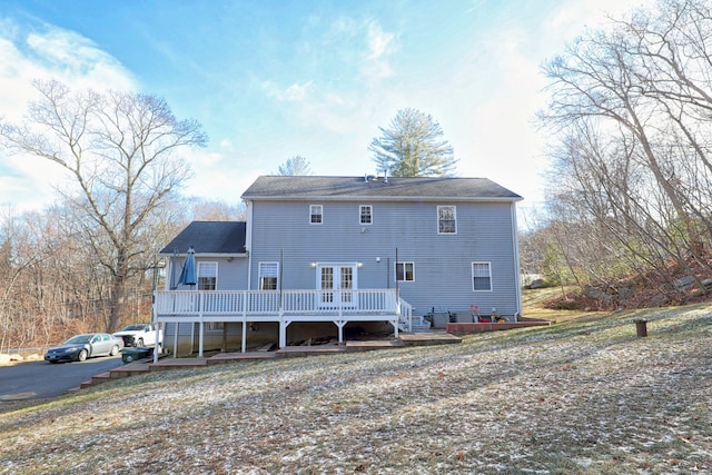 rear view of property with a deck