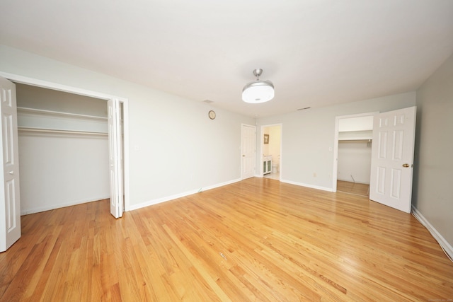 unfurnished bedroom with light hardwood / wood-style flooring