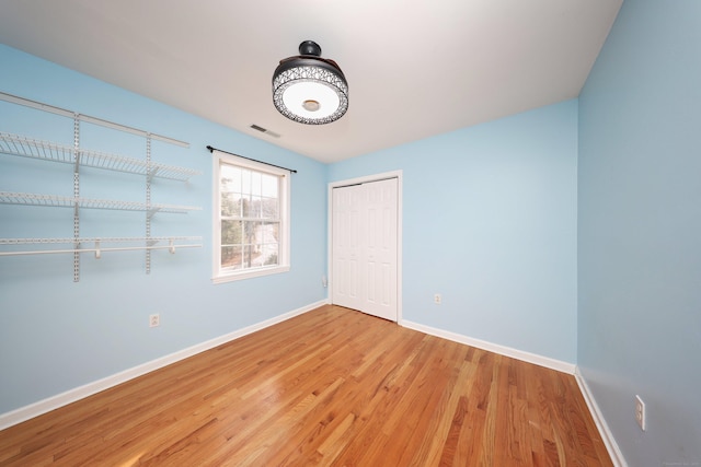 interior space with hardwood / wood-style flooring