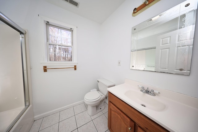 full bathroom featuring tile patterned flooring, vanity, toilet, and bath / shower combo with glass door