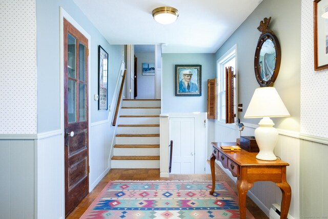 foyer entrance featuring hardwood / wood-style flooring